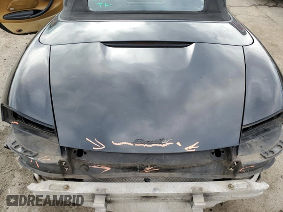 2000 Porsche Boxster z VIN WP0CA2980YU626358, wystawiony jako Copart lot #36977344 z przebiegiem 117 561 mil mil oraz Szkoda całkowita • Salvage title. Historia ofert i sprzedaży dostępna na DreamBid. Obrazek 11.