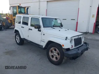 2014 Jeep Wrangler Unlimited Sahara z VIN 1C4BJWEG2EL178920, wystawiony jako IAAI lot #42278188 z przebiegiem 133 184 mil mil oraz . Historia ofert i sprzedaży dostępna na DreamBid. Obrazek 1.