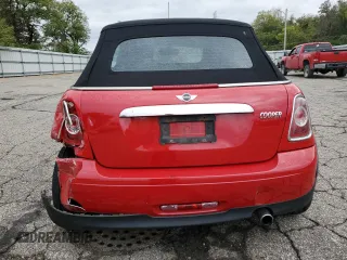 2011 MINI Convertible with VIN WMWZN3C51BTZ78331, listed as a Copart auction lot 73348304 with 94,219 mi miles and Salvage title. Bid and sale history available at DreamBid. Image 6.