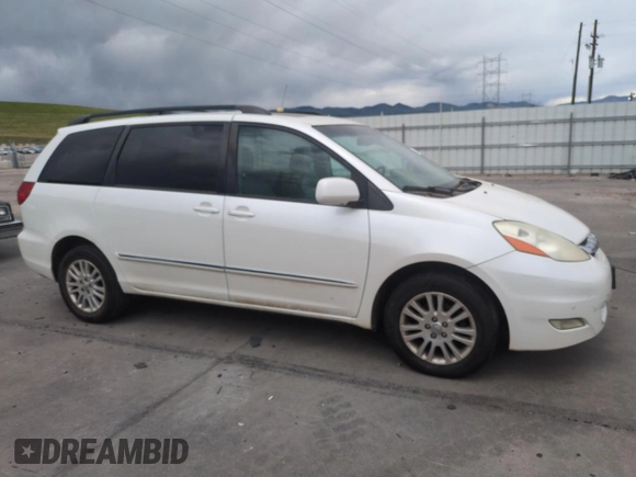 2010 Toyota Sienna XLE with VIN 5TDDK4CC5AS032076, listed as a Copart auction lot 57675555 with 210,252 mi miles and Clean title. Bid and sale history available at DreamBid. Image 4.