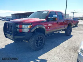2015 Ford Super Duty F-250 SRW Lariat with VIN 1FT7W2BTXFED39893, listed as a IAAI auction lot 41620936 with 153,814 mi miles. Bid and sale history available at carsss.com. Image 2.