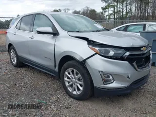 2018 Chevrolet Equinox LT z VIN 3GNAXSEV0JS524721, wystawiony jako IAAI lot #41826347 z przebiegiem 127 923 mil mil oraz . Historia ofert i sprzedaży dostępna na DreamBid. Obrazek 1.