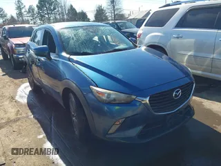 2018 Mazda CX-3 Touring with VIN JM1DKFC73J0301449, listed as a IAAI auction lot 41678604 with 105,249 mi miles. Bid and sale history available at carsss.com. Image 1.