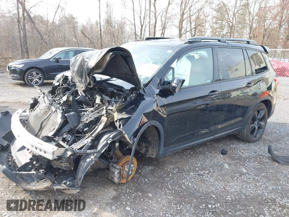 2019 Honda Passport Elite with VIN 5FNYF8H00KB010472, listed as a IAAI auction lot 42013475 with 62,577 mi miles. Bid and sale history available at carsss.com. Image 2.