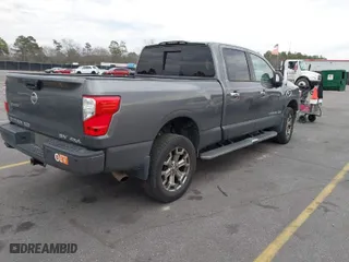 2019 Nissan Titan XD SV with VIN 1N6BA1F47KN507177, listed as a IAAI auction lot 41470719 with 114,232 mi miles. Bid and sale history available at carsss.com. Image 4.