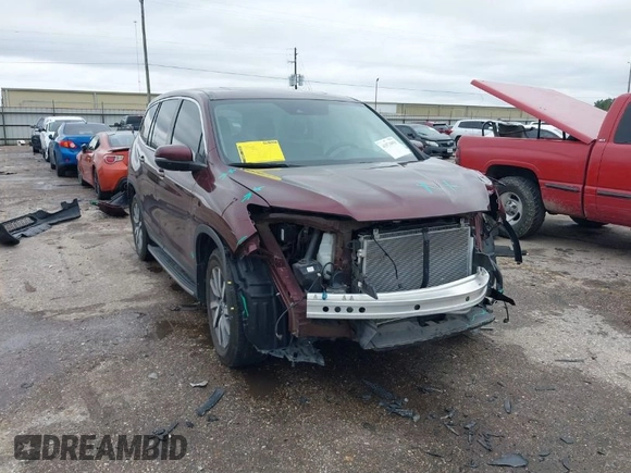 2019 Honda Pilot EX-L with VIN 5FNYF5H59KB026597, listed as a IAAI auction lot 41574993 with 67,750 mi miles. Bid and sale history available at carsss.com. Image 1.