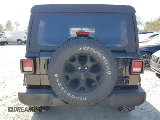 2022 Jeep Wrangler Unlimited Sport S with VIN 1C4HJXDG8NW130208, listed as a Copart auction lot 52572095 with 111,128 mi miles and Salvage Title. Bid and sale history available at DreamBid. Image 6.