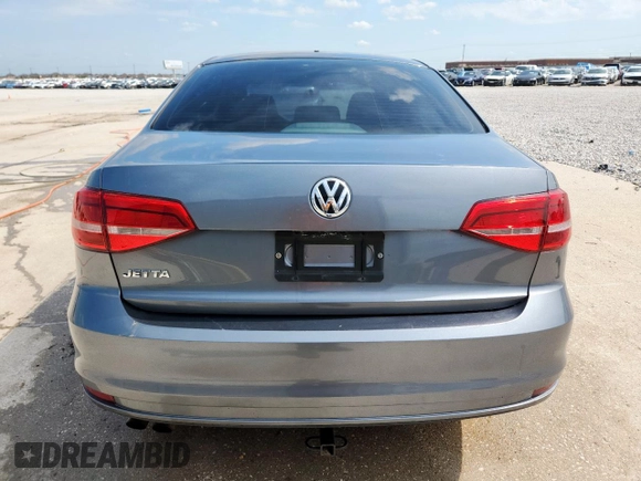 2015 Volkswagen Jetta S with VIN 3VW2K7AJ8FM242136, listed as a Copart auction lot 61063545 with Not provided miles and Salvage title. Bid and sale history available at DreamBid. Image 6.