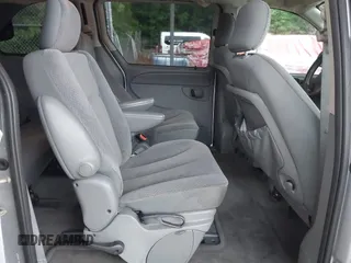 2005 Dodge Caravan SXT with VIN 1D4GP45RX5B289704, listed as a IAAI auction lot 42758561 with 110,396 mi miles and . Bid and sale history available at DreamBid. Image 8.