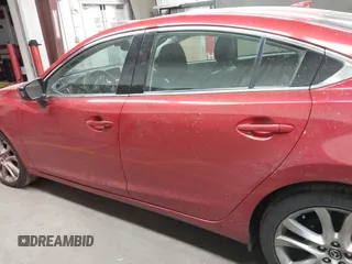 2016 Mazda 6 i Grand Touring с VIN JM1GJ1W50G1474054, выставлен на аукционе IAAI как лот 42162163 с пробегом 97 169 миль миль и . История ставок и продаж доступна на DreamBid. Изображение 14.