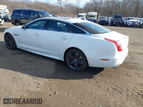 2015 Jaguar XJ with VIN SAJWA2EK9FMV87430, listed as a IAAI auction lot 41408797 with 101,147 mi miles and . Bid and sale history available at DreamBid. Image 3.
