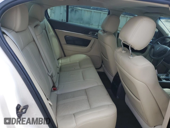 2013 Lincoln MKS with VIN 1LNHL9EK8DG605675, listed as a Copart auction lot 62448455 with 102,642 mi miles and Salvage title. Bid and sale history available at DreamBid. Image 10.