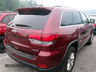 2021 Jeep Grand Cherokee Laredo X with VIN 1C4RJFAG3MC611583, listed as a IAAI auction lot 42631284 with 99,457 mi miles and . Bid and sale history available at DreamBid. Image 7.