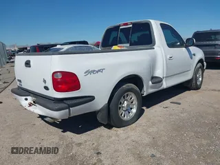 2001 Ford F-150 XL with VIN 2FTZF07221CA45965, listed as a IAAI auction lot 41621617 with 190,372 mi miles. Bid and sale history available at carsss.com. Image 4.