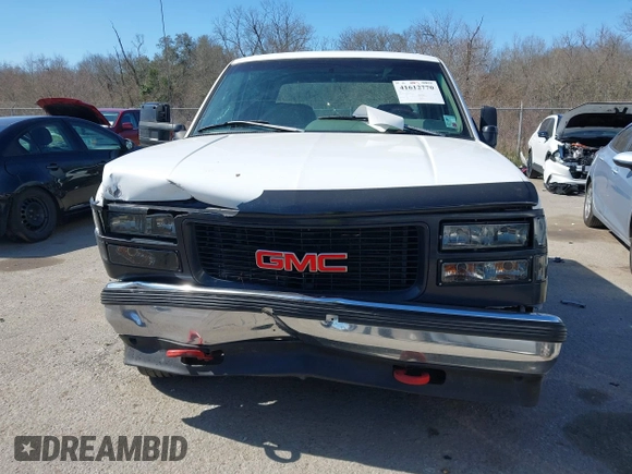 1996 GMC Sierra 1500 with VIN 1GTGC33R4TF018147, listed as a IAAI auction lot 41612770 with 106,443 mi miles and . Bid and sale history available at DreamBid. Image 12.