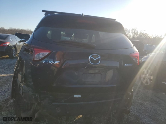 2015 Mazda CX-5 Grand Touring with VIN JM3KE2DY6F0511329, listed as a Copart auction lot 48656945 with 203,540 mi miles and Salvage Title. Bid and sale history available at carsss.com. Image 6.