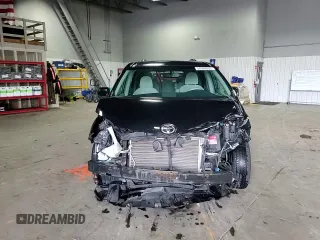 2014 Toyota Sienna LE AAS z VIN 5TDKK3DC0ES432309, wystawiony jako Copart lot #54094805 z przebiegiem 139 342 mil mil oraz Szkoda całkowita • Salvage title. Historia ofert i sprzedaży dostępna na DreamBid. Obrazek 14.