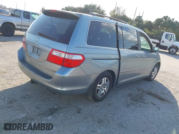 2006 Honda Odyssey EX-L with VIN 5FNRL38796B077297, listed as a IAAI auction lot 41492810 with 292,164 mi miles and . Bid and sale history available at carsss.com. Image 4.