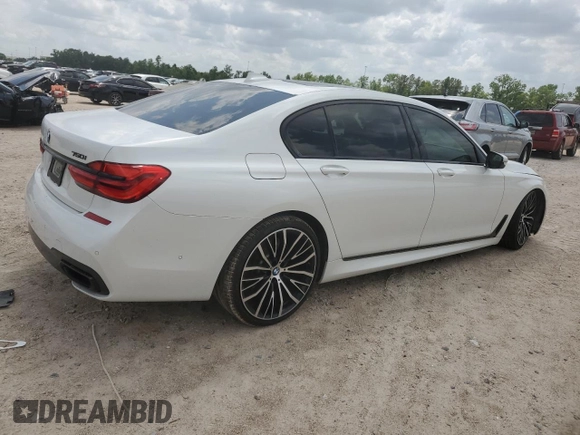 2019 BMW 7 Series 750i с VIN WBA7F0C52KGM24906, выставлен на аукционе Copart как лот 53934735 с пробегом 96 247 миль миль и Списание • Salvage title. История ставок и продаж доступна на DreamBid. Изображение 3.