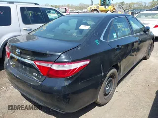 2015 Toyota Camry LE z VIN 4T1BD1FK7FU159767, wystawiony jako IAAI lot #42175153 z przebiegiem Nie podano mil oraz . Historia ofert i sprzedaży dostępna na DreamBid. Obrazek 4.