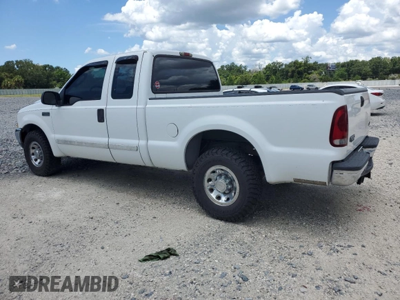 2003 Ford F-250 XL with VIN 1FTNX20L63EB37975, listed as a Copart auction lot 65723935 with 157,377 mi miles and Salvage title. Bid and sale history available at DreamBid. Image 2.