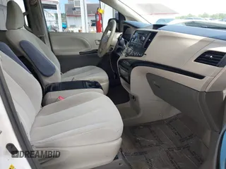 2014 Toyota Sienna LE AAS with VIN 5TDKK3DC2ES513425, listed as a IAAI auction lot 42107820 with 367,844 mi miles and . Bid and sale history available at carsss.com. Image 5.