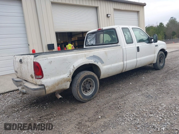 2004 Ford Super Duty F-250 XL with VIN 1FTNX20L34EA13731, listed as a IAAI auction lot 41510742 with 323,217 mi miles. Bid and sale history available at carsss.com. Image 4.