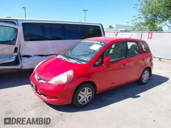 2007 Honda Fit z VIN JHMGD37427S060145, wystawiony jako IAAI lot #42374305 z przebiegiem 282 714 mil mil oraz . Historia ofert i sprzedaży dostępna na DreamBid. Obrazek 2.