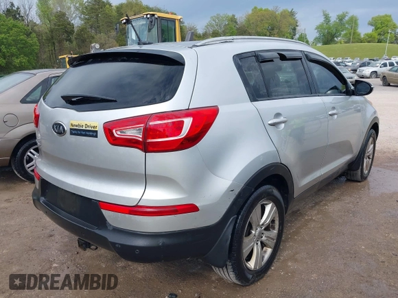 2011 Kia Sportage LX with VIN KNDPB3A23B7053943, listed as a IAAI auction lot 42063941 with 234,364 mi miles and . Bid and sale history available at carsss.com. Image 4.