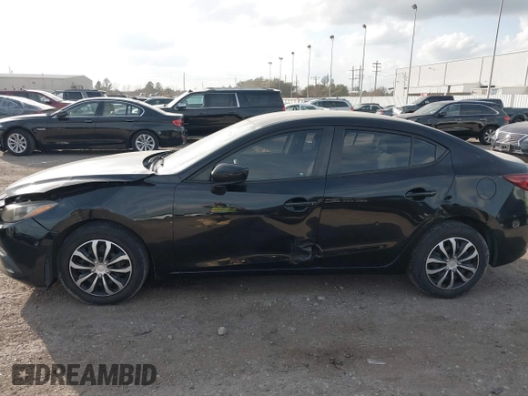 2015 Mazda 3 i SV with VIN JM1BM1T76F1262569, listed as a IAAI auction lot 41472375 with 89,932 mi miles. Bid and sale history available at carsss.com. Image 14.