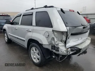 2009 Jeep Grand Cherokee Laredo with VIN 1J8HR48P19C555965, listed as a Copart auction lot 45602315 with 110,762 mi miles and Salvage Title. Bid and sale history available at carsss.com. Image 2.