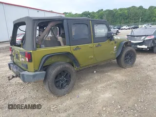 2007 Jeep Wrangler Unlimited X with VIN 1J4GA39177L164566, listed as a IAAI auction lot 42588655 with 50,915 mi miles and . Bid and sale history available at DreamBid. Image 4.