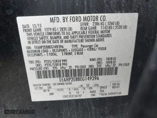 2014 Ford Taurus SEL with VIN 1FAHP2E88EG149396, listed as a IAAI auction lot 41489410 with 190,648 mi miles. Bid and sale history available at carsss.com. Image 9.