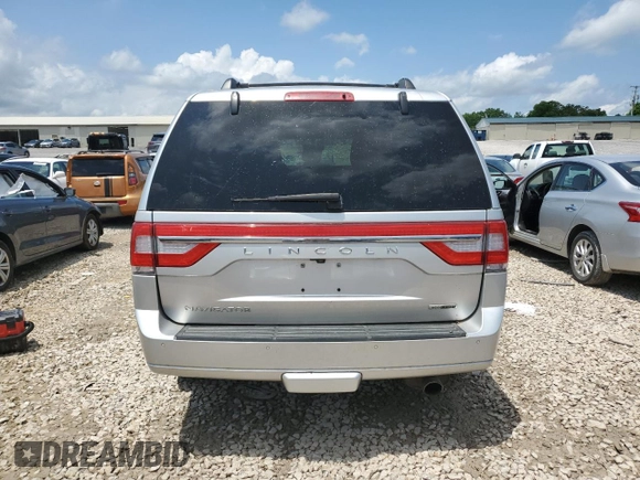 2016 Lincoln Navigator Select z VIN 5LMJJ2HT8GEL06901, wystawiony jako Copart lot #56497005 z przebiegiem 89 930 mil mil oraz Szkoda całkowita • Salvage title. Historia ofert i sprzedaży dostępna na DreamBid. Obrazek 6.