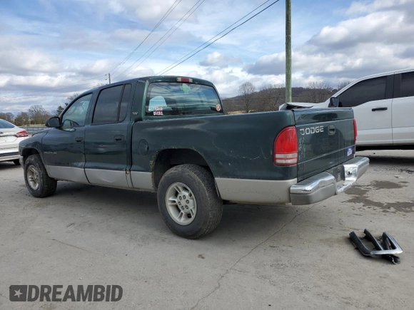2000 Dodge Dakota Sport z VIN 1B7GL2AX6YS602043, wystawiony jako Copart lot #41380085 z przebiegiem 186 557 mil mil oraz Szkoda całkowita • Salvage title. Historia ofert i sprzedaży dostępna na DreamBid. Obrazek 2.