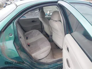 1999 Ford Contour SE Fleet with VIN 1FAFP66L3XK227522, listed as a IAAI auction lot 41702873 with 140,926 mi miles. Bid and sale history available at carsss.com. Image 8.