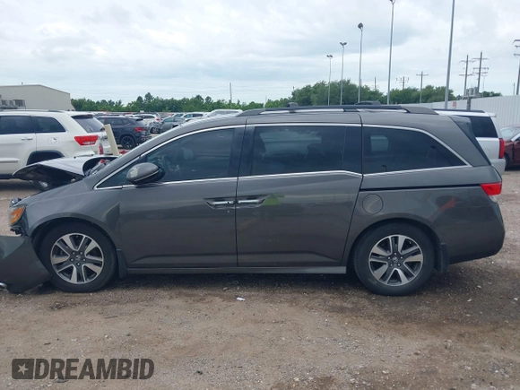 2015 Honda Odyssey Touring Elite with VIN 5FNRL5H99FB089642, listed as a IAAI auction lot 42591786 with 100,755 mi miles and . Bid and sale history available at DreamBid. Image 15.