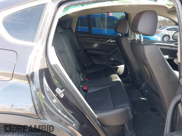 2017 BMW X4 xDrive28i with VIN 5UXXW3C36H0T79679, listed as a IAAI auction lot 42203662 with 137,863 mi miles and . Bid and sale history available at DreamBid. Image 8.