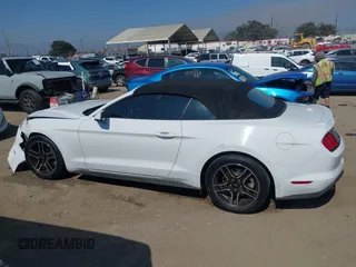 2020 Ford Mustang EcoBoost z VIN 1FATP8UH0L5105965, wystawiony jako IAAI lot #42475841 z przebiegiem 68 999 mil mil oraz . Historia ofert i sprzedaży dostępna na DreamBid. Obrazek 15.