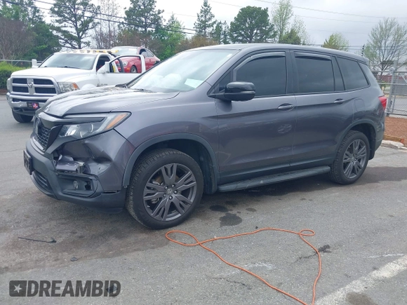 2020 Honda Passport EX-L z VIN 5FNYF8H5XLB018060, wystawiony jako IAAI lot #41961243 z przebiegiem 60 575 mil mil oraz . Historia ofert i sprzedaży dostępna na DreamBid. Obrazek 17.
