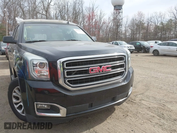 2015 GMC Yukon SLT z VIN 1GKS1BKCXFR192349, wystawiony jako IAAI lot #41842474 z przebiegiem 185 166 mil mil oraz . Historia ofert i sprzedaży dostępna na DreamBid. Obrazek 12.