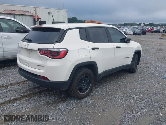 2019 Jeep Compass Sport z VIN 3C4NJCAB7KT646551, wystawiony jako IAAI lot #42603669 z przebiegiem 73 110 mil mil oraz . Historia ofert i sprzedaży dostępna na DreamBid. Obrazek 4.