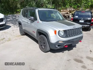 2018 Jeep Renegade Trailhawk z VIN ZACCJBCB3JPG76327, wystawiony jako IAAI lot #42299355 z przebiegiem 85 996 mil mil oraz . Historia ofert i sprzedaży dostępna na DreamBid. Obrazek 1.