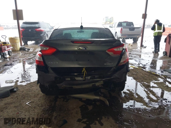 2013 Ford Focus SE with VIN 1FADP3F29DL243937, listed as a IAAI auction lot 42145911 with 90,376 mi miles and . Bid and sale history available at DreamBid. Image 16.