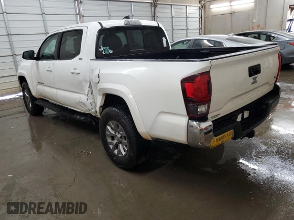 2018 Toyota Tacoma SR5 with VIN 3TMAZ5CN7JM074058, listed as a Copart auction lot 51586455 with 117,877 mi miles and Salvage Title. Bid and sale history available at DreamBid. Image 2.