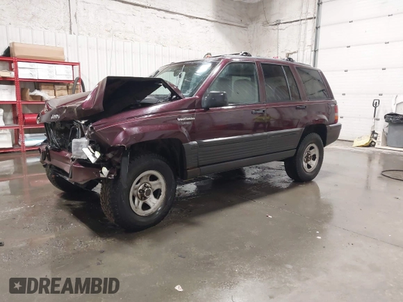 1995 Jeep Grand Cherokee Laredo with VIN 1J4GZ58S2SC679918, listed as a IAAI auction lot 41840415 with 261,434 mi miles. Bid and sale history available at carsss.com. Image 17.