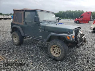 1998 Jeep Wrangler Sport with VIN 1J4FY19S5WP795781, listed as a Copart auction lot 59718065 with 208,416 mi miles and Salvage title. Bid and sale history available at DreamBid. Image 4.