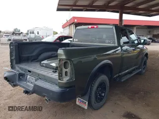 2021 Ram 1500 Warlock with VIN 1C6RR7GT0MS583144, listed as a IAAI auction lot 41776771 with 27,152 mi miles and . Bid and sale history available at DreamBid. Image 4.