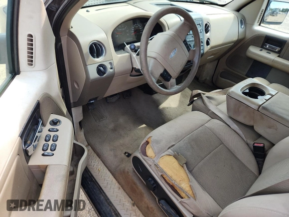 2005 Ford F-150 XLT with VIN 1FTRX12565KB21614, listed as a Copart auction lot 61488075 with 202,747 mi miles and Salvage title. Bid and sale history available at DreamBid. Image 8.