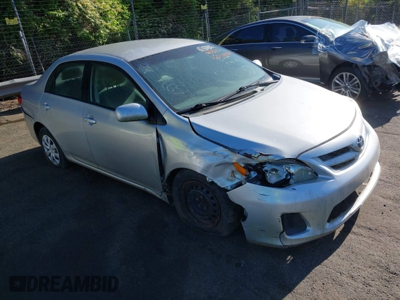 2011 Toyota Corolla L with VIN 2T1BU4EE9BC713402, listed as a IAAI auction lot 42044806 with 121,894 mi miles. Bid and sale history available at carsss.com. Image 1.